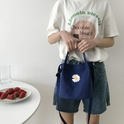 Umhänge-/Handtasche mit Gänseblümchen